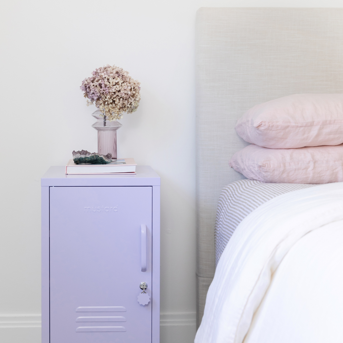 The Shorty in Lilac to the Left
